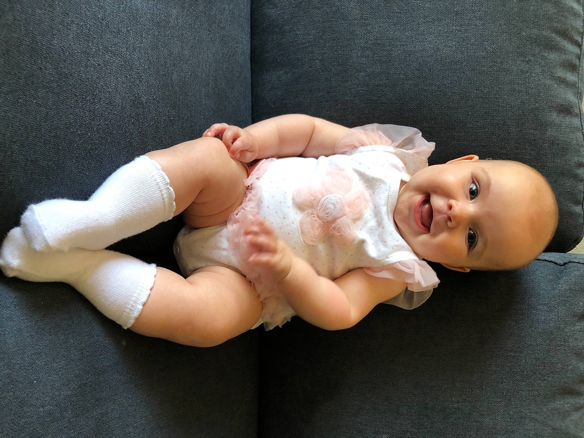 Mea is registered to the contest to win money with this photo: baby, baby_toddler_clothing, barefoot, chest, comfort, dress, elbow, eye, finger, flash_photography, foot, headgear, human_body, knee, lip, nail, person, skin, thigh, toddler