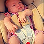 Eleanor a rejoint le concours — aidez-le/la à gagner de superbes lots ! baby, infant, car_seat, seatbelt, straps, red_striped_clothing, beige, child, cute, chubby, small_hand, small_foot, head, face, sitting, resting, child_safety, indoors, soft_lighting, heart_icon