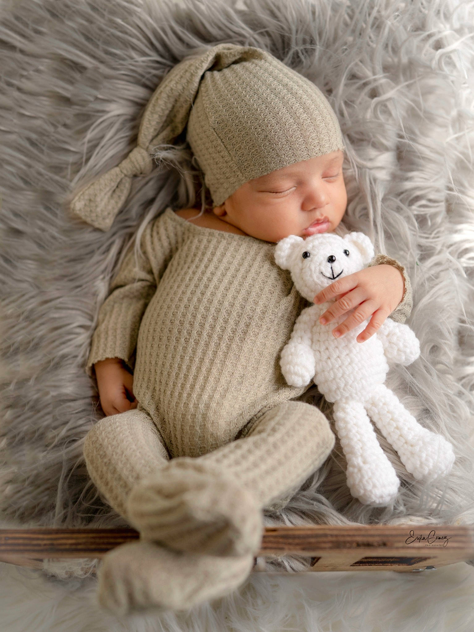 Michael joined the competition — help win amazing prizes! baby, cap, child, comfort, doll, fawn, fur, hand, headwear, human_body, knit_cap, linens, pattern, person, skin, stuffed_toy, textile, toy, white, wood