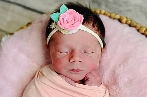 Lily is registered to the contest to win money with this photo: child, hair_accessory, headband, headgear, headpiece, infant, jewellery, person, pink, product