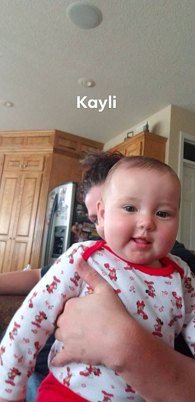 Kayli Tasker is registered to the contest to win money with this photo: arm, cheek, child, day, ear, finger, girl, head, infant, mouth, nose, person, product, skin, toddler