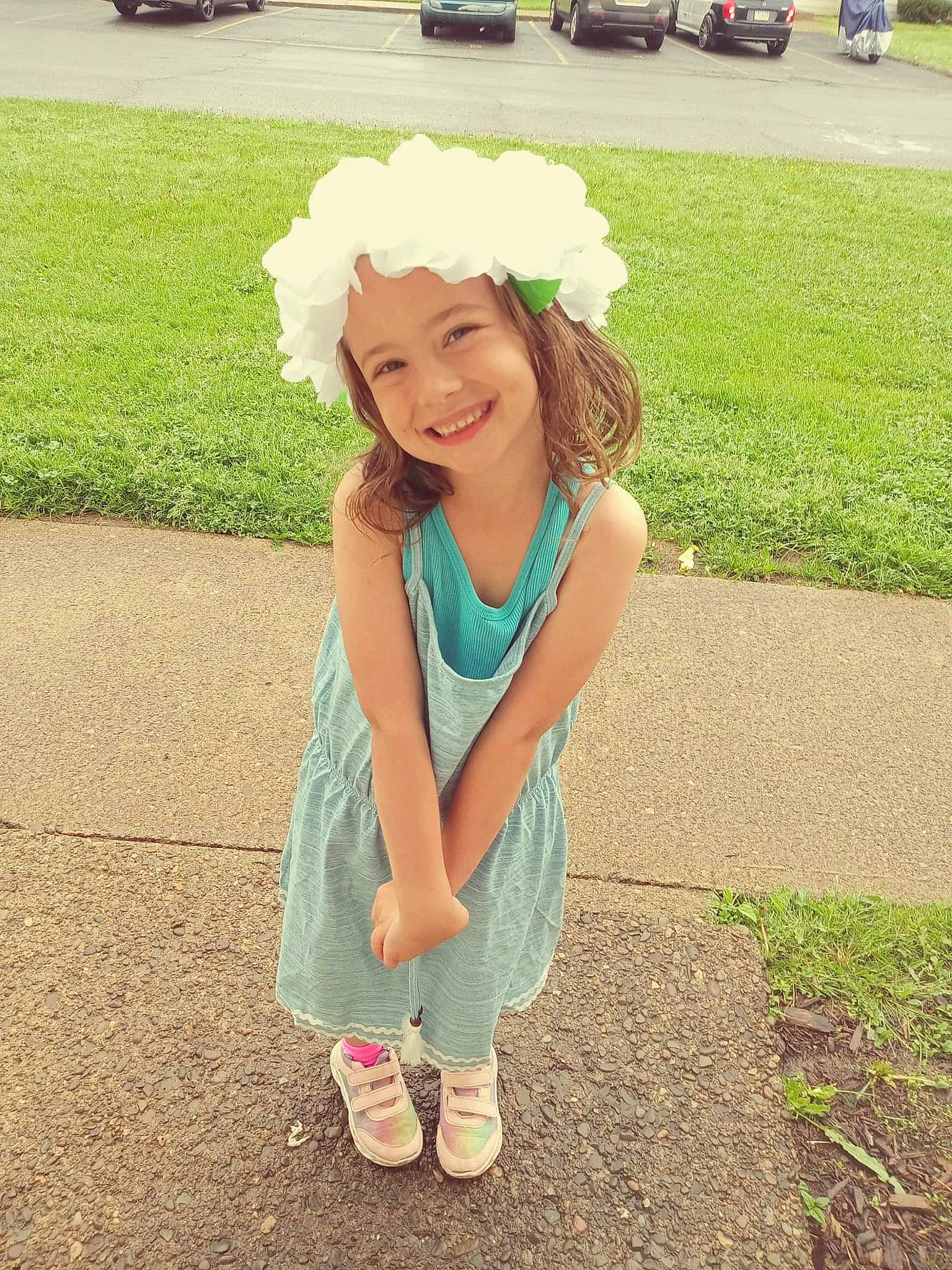 Chrysanthemum is registered to the contest to win money with this photo: cool, electric_blue, flower, fun, grass, happy, headpiece, headwear, joy, leaf, leisure, long_hair, people_in_nature, person, petal, pink, plant, shoe, smile, sneakers