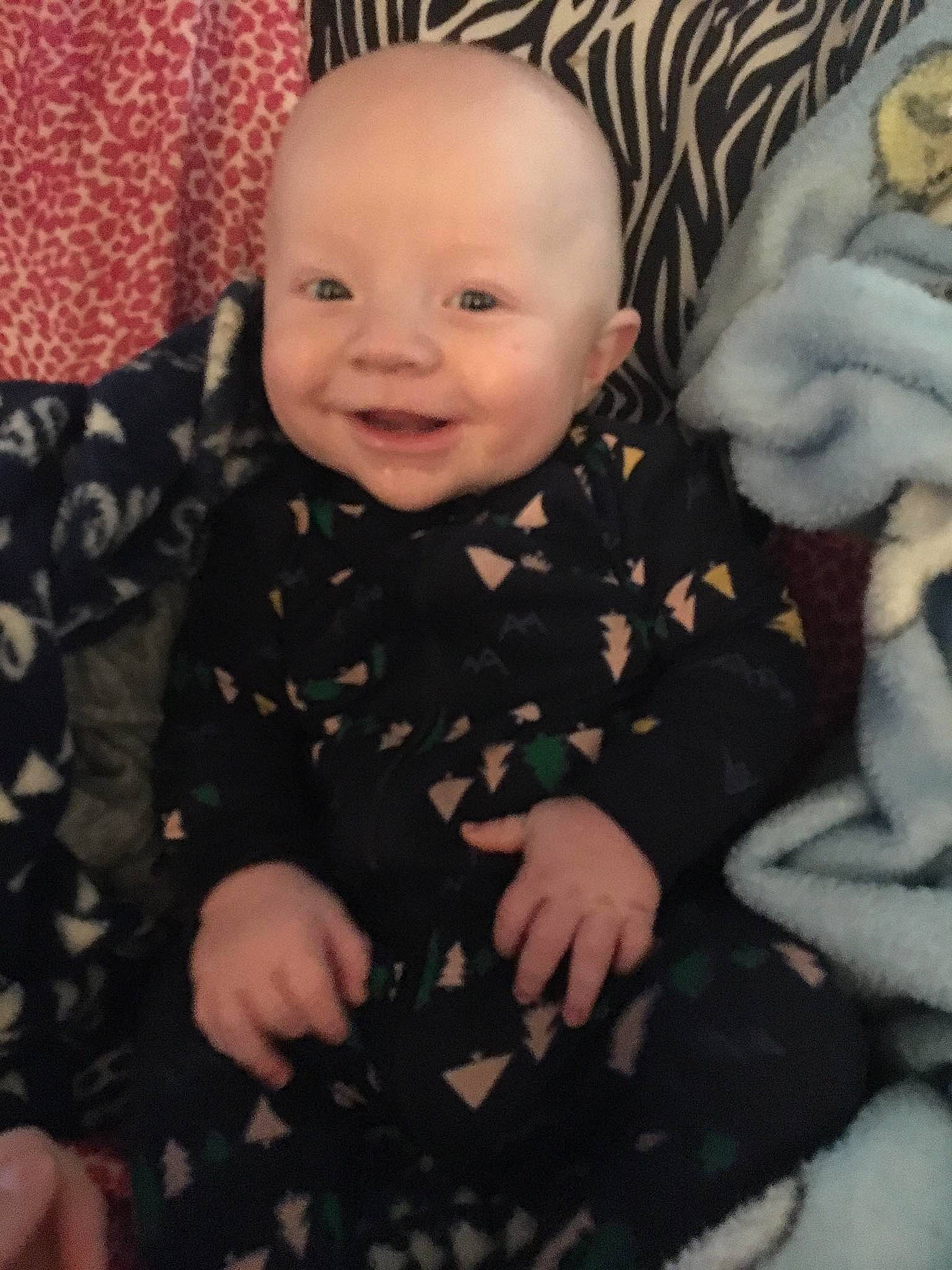 Zaidyn is registered to the contest to win money with this photo: boy, cheek, child, day, eye, face, head, infant, iris, joy, nose, person, product, sitting, skin, smile, toddler