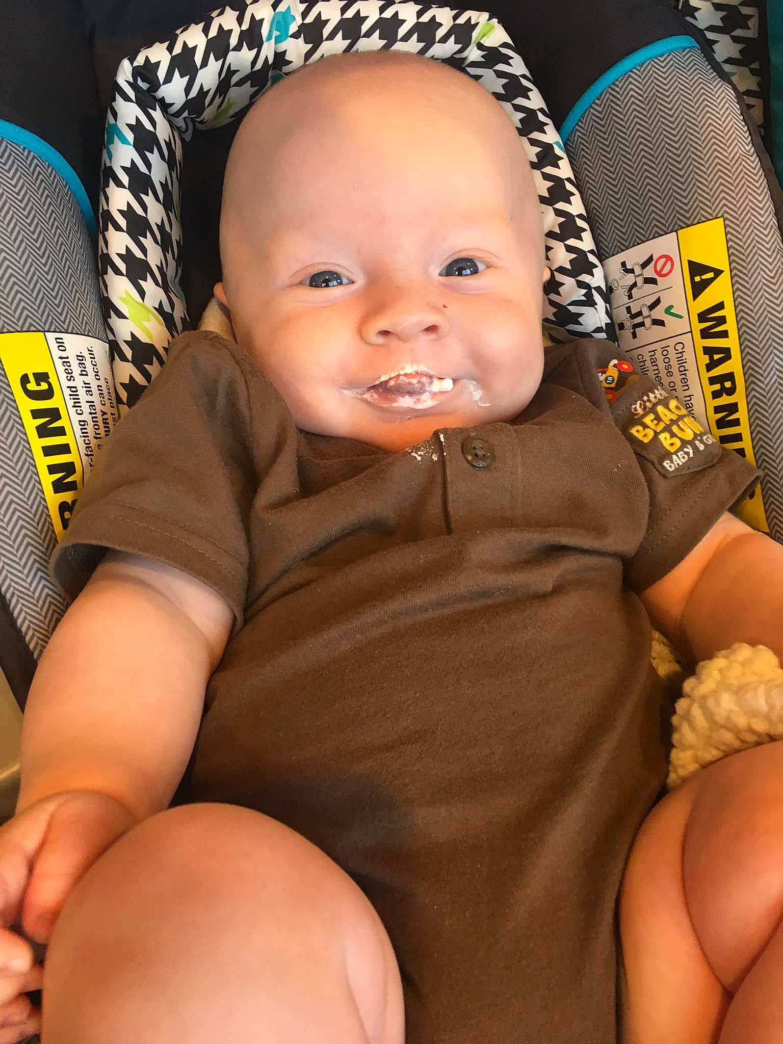 Zaidyn is registered to the contest to win money with this photo: abdomen, arm, child, finger, hand, infant, person, product, sitting, smile, toddler