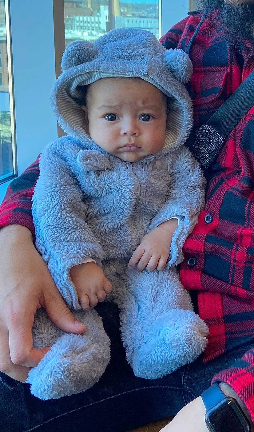 Luis joined the competition — help win amazing prizes! baby, baby_toddler_clothing, blue, cap, cheek, child, electric_blue, eye, face, hat, headwear, organ, outerwear, pattern, person, plaid, skin, sleeve, tartan, toddler