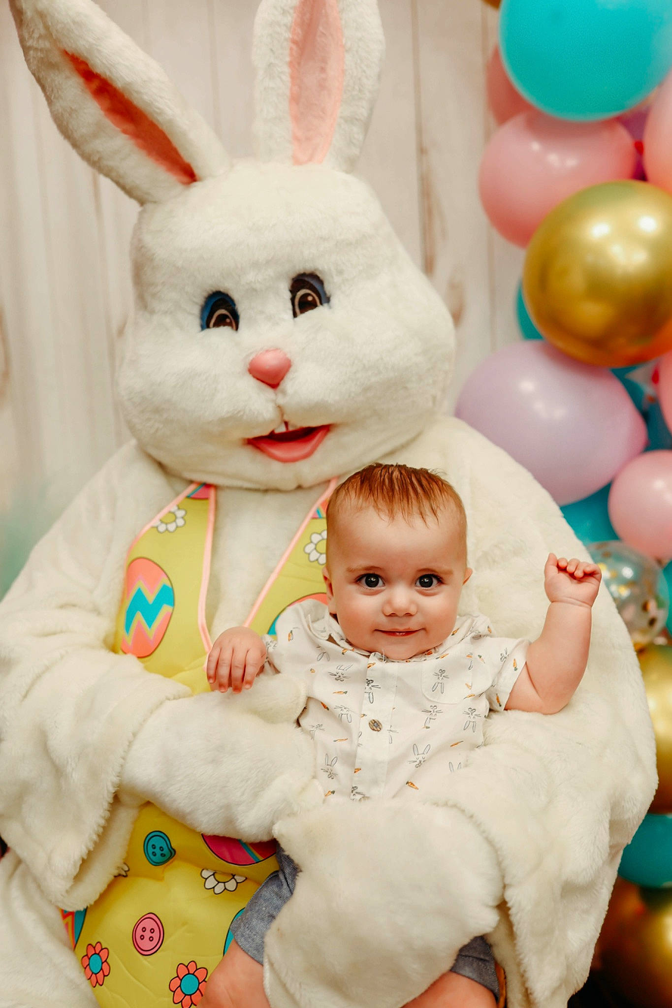 Axl is registered to the contest to win money with this photo: baby_toddler_clothing, balloon, beauty, blue, domestic_rabbit, event, facial_expression, green, happy, joy, mammal, organ, person, photograph, pink, rabbit, rabbits_and_hares, smile, snapshot, toddler