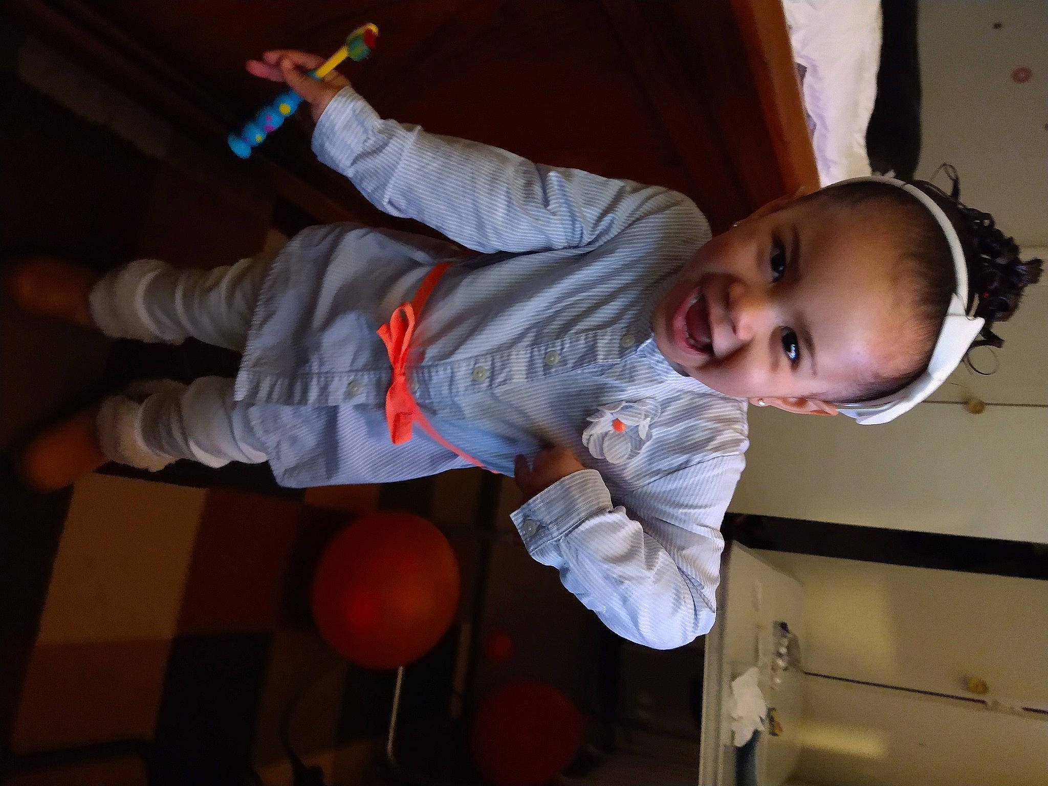 Ahzara joined the competition — help win amazing prizes! arm, baby, baby_toddler_clothing, ball, child, door, elbow, fun, happy, human_body, joint, leg, orange, person, play, room, sitting, smile, suit, thumb