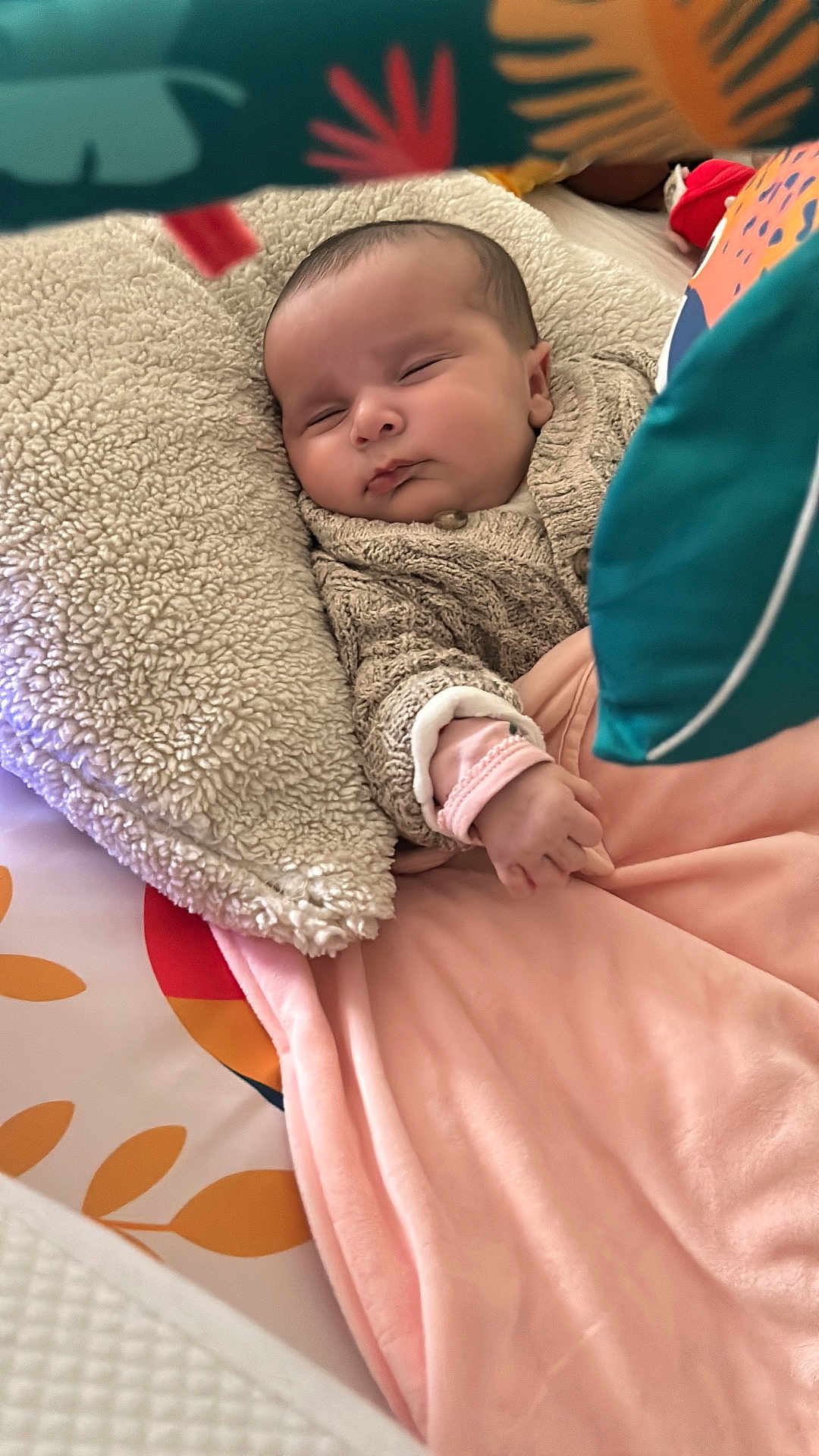 Ava participe au concours pour gagner de l'argent avec cette photo : baby, infant, newborn, sleeping, blanket, pillow, plush, knit_sweater, hand, closed_eyes, cozy, soft_texture, nursery, play_gym, toy, portrait, pink_blanket, resting, cute, homedecor