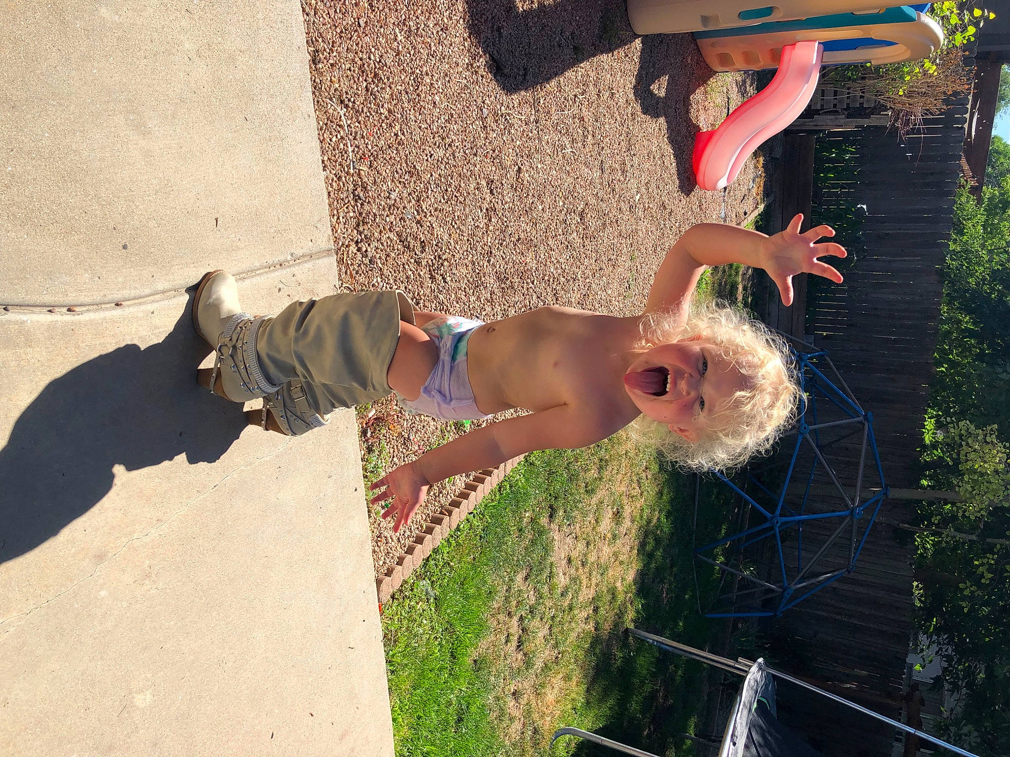 Madison is registered to the contest to win money with this photo: child, dress, elbow, fawn, flesh, fun, grass, happy, human_leg, landscape, leg, leisure, mammal, people_in_nature, person, shadow, thigh, tree, trunk, waist