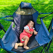 Praneeth Thunugunta joined the competition — help win amazing prizes! baby, sleeping, chair, outdoor, grass, greenery, infant, nap, sunlight, coral_outfit, barefoot, bracelet, relaxing, nature, daytime, comfort, peaceful, child, portrait, summer
