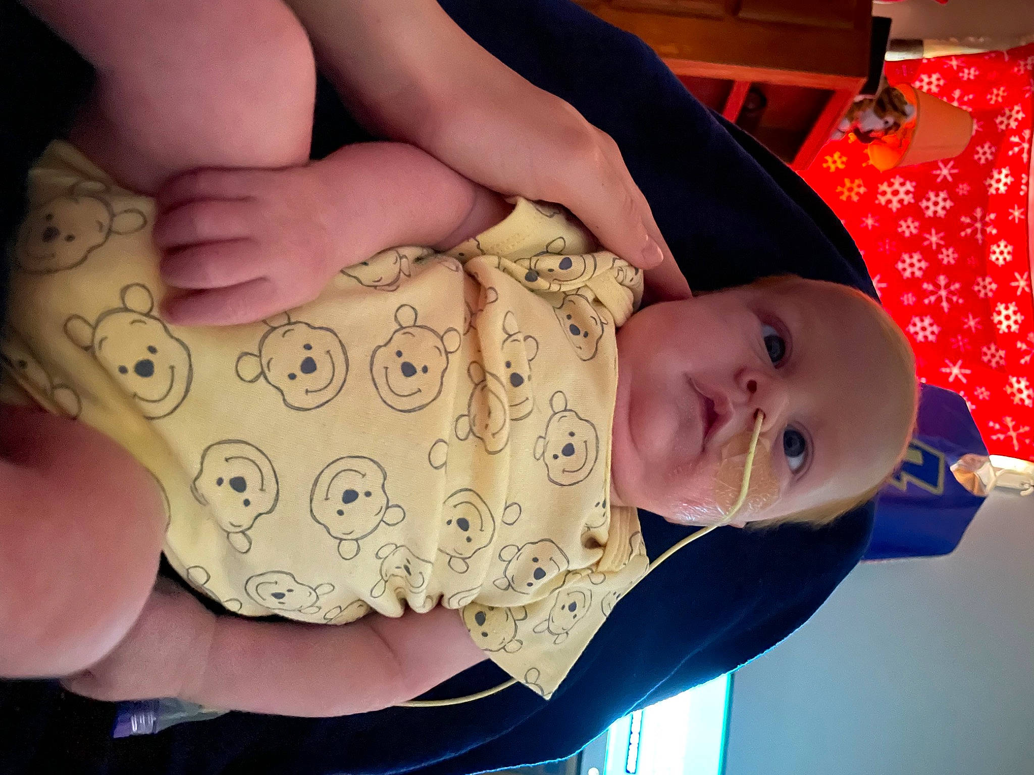 Levi is registered to the contest to win money with this photo: arm, baby, baby_toddler_clothing, cheek, child, eye, finger, gesture, hand, happy, head, human_body, mouth, nail, nose, person, product, skin, sleeve, textile