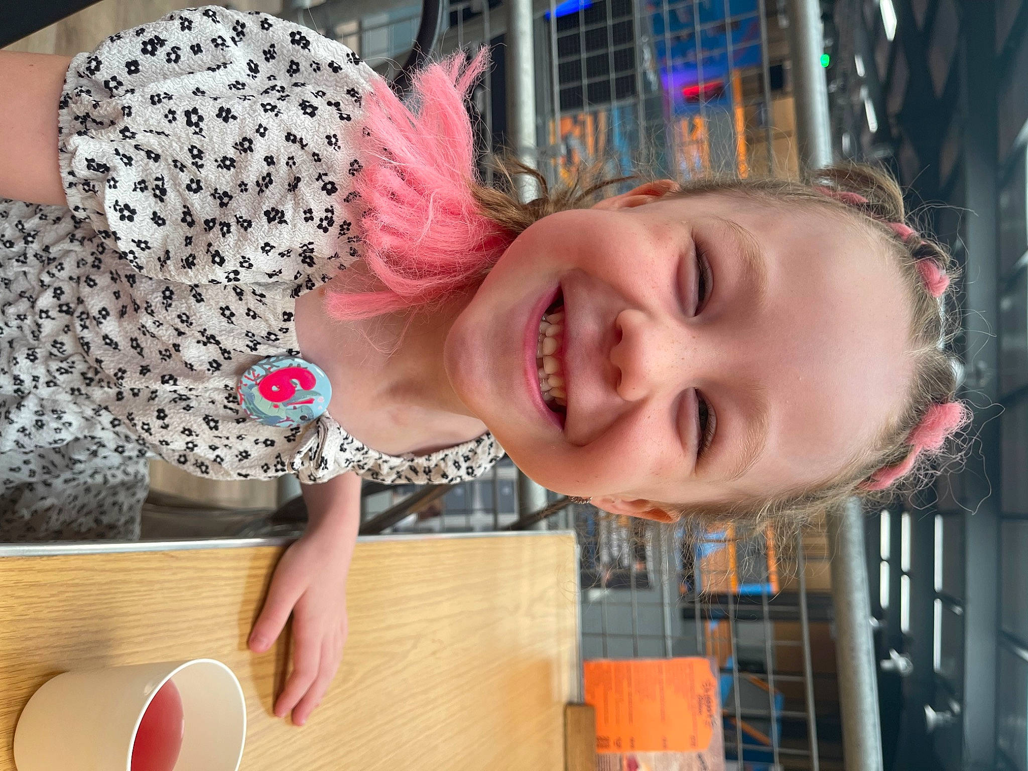 Madison is registered to the contest to win money with this photo: child, city, fashion_accessory, fun, happy, joy, laugh, leisure, magenta, pattern, person, pink, play, smile, toddler, wood