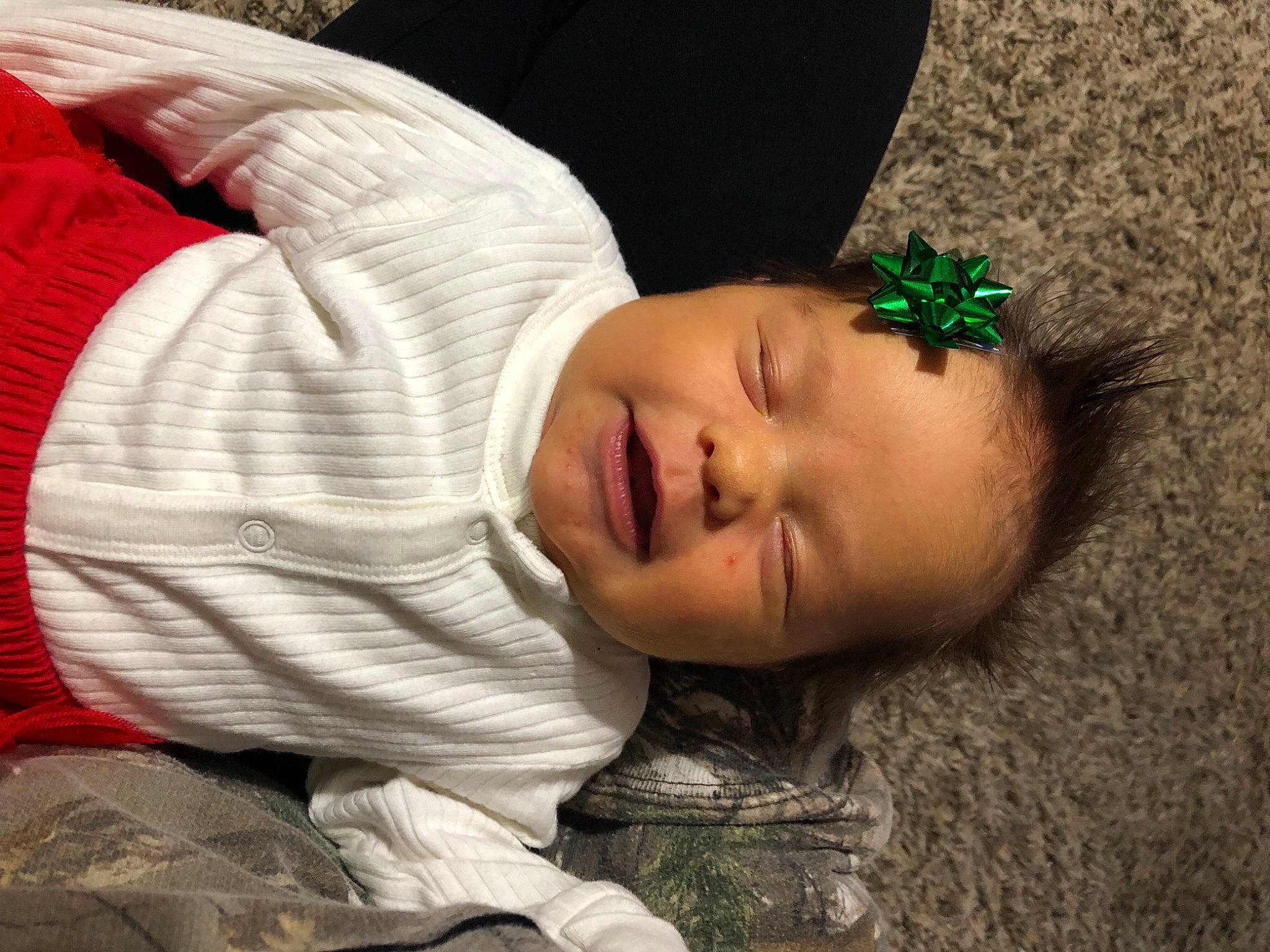 Brookelynn joined the competition — help win amazing prizes! black_hair, child, comfort, eye, eyelash, face, fashion_accessory, grass, happy, headpiece, linens, lip, mouth, nap, nose, person, personal_protective_equipment, sitting, skin, toddler