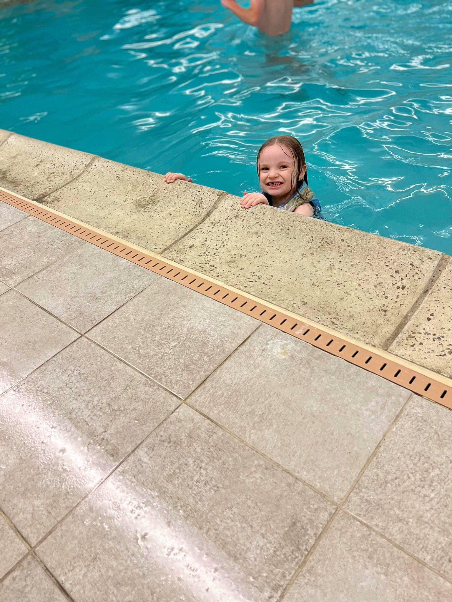 Willow joined the competition — help win amazing prizes! asphalt, composite_material, concrete, flooring, fun, individual_sports, joy, leisure, leisure_centre, pattern, person, personal_protective_equipment, recreation, rectangle, road_surface, smile, sports, swimmer, swimming_pool, vacation