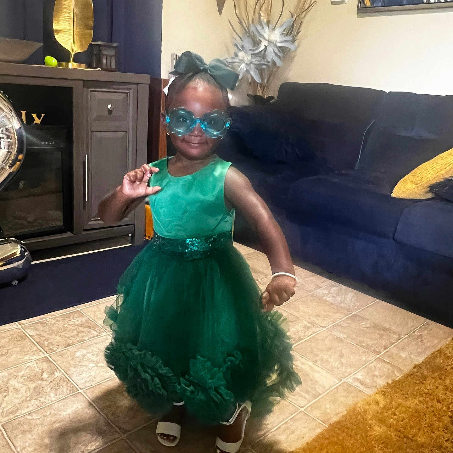 Amiyah joined the competition — help win amazing prizes! accessories, architecture, building, child, clothing, costume, couch, dress, face, female, furniture, girl, head, indoors, livingroom, person, photography, portrait, room, sunglasses