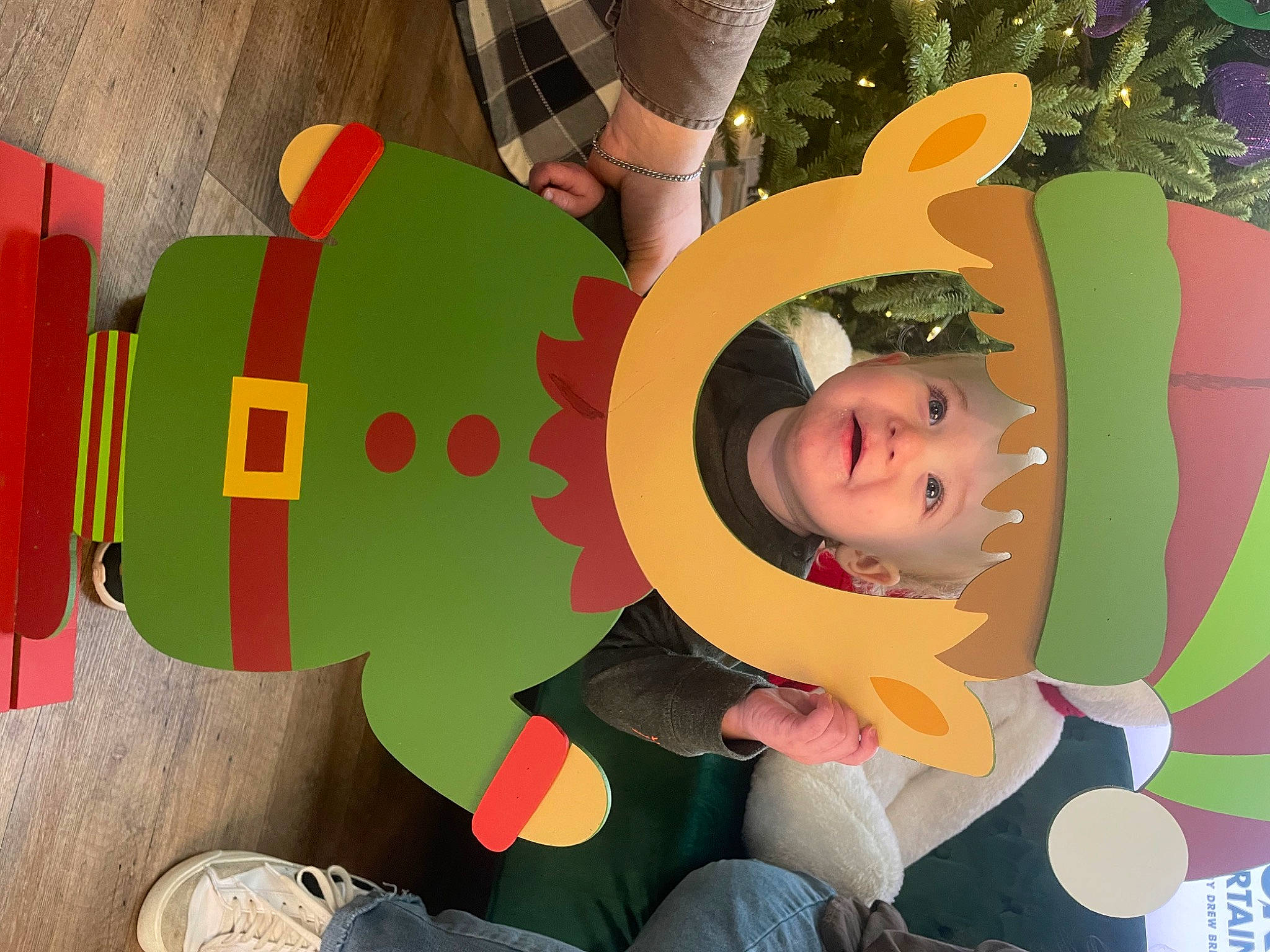 Huxley is registered to the contest to win money with this photo: animation, art, child, circle, costume, fictional_character, fun, games, grass, green, happy, headgear, leisure, orange, pattern, person, plant, play, tree, vertebrate