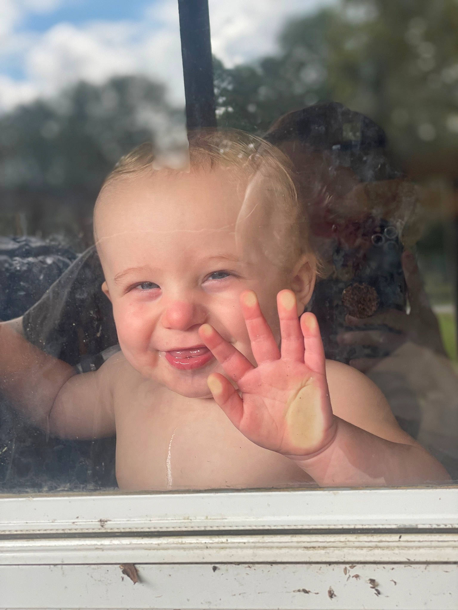 Huxley is registered to the contest to win money with this photo: baby, facial_expression, finger, gesture, hairstyle, hand, happy, human_body, iris, leisure, lip, mouth, nose, person, recreation, skin, sky, smile, thumb, toddler