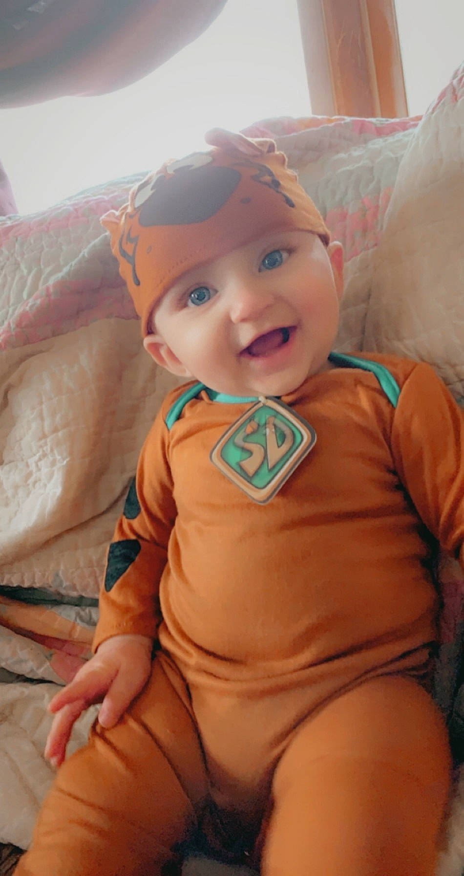 Andrew is registered to the contest to win money with this photo: abdomen, arm, baby, baby_toddler_clothing, cheek, chest, doll, finger, happy, headgear, headwear, human_body, iris, mouth, neck, person, skin, smile, textile, thigh