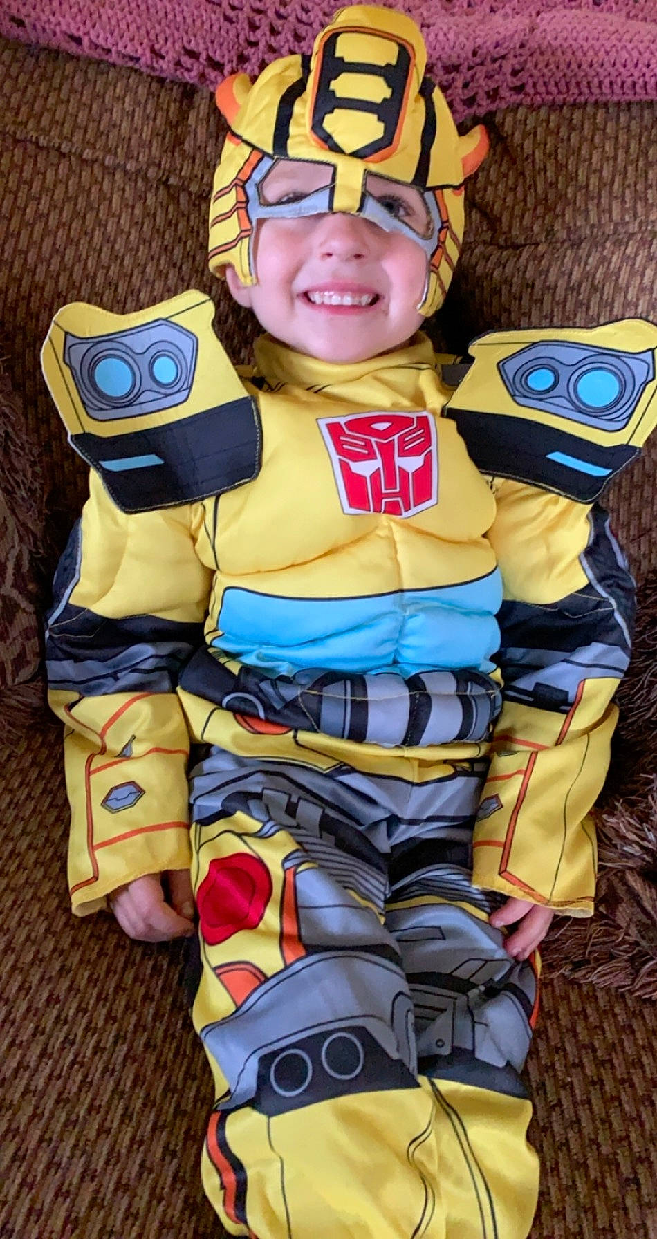 Ayden is registered to the contest to win money with this photo: belt, blue, child, electric_blue, eye, fictional_character, fun, gesture, glove, happy, head, headwear, helmet, joy, mascot, person, personal_protective_equipment, smile, sports_gear, thumb