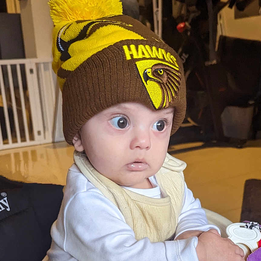 Izaya joined the competition — help win amazing prizes! baby, baseballcap, beanie, bodypart, bonnet, cap, clothing, couch, face, finger, fleece, furniture, glove, hand, hat, head, person, photography, portrait, wood