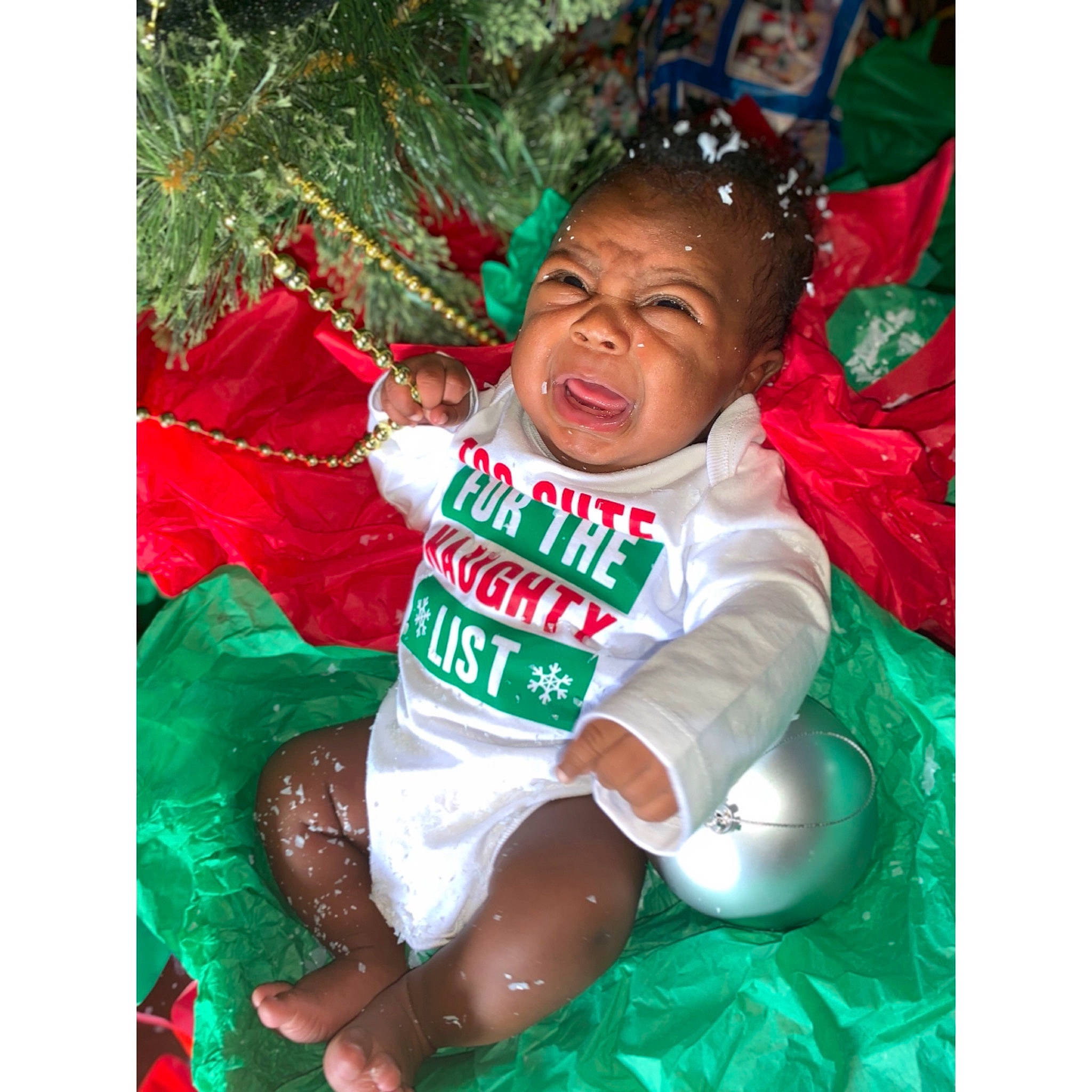 Kacen is registered to the contest to win money with this photo: child, christmas, christmas_ornament, holiday, person, play, toddler