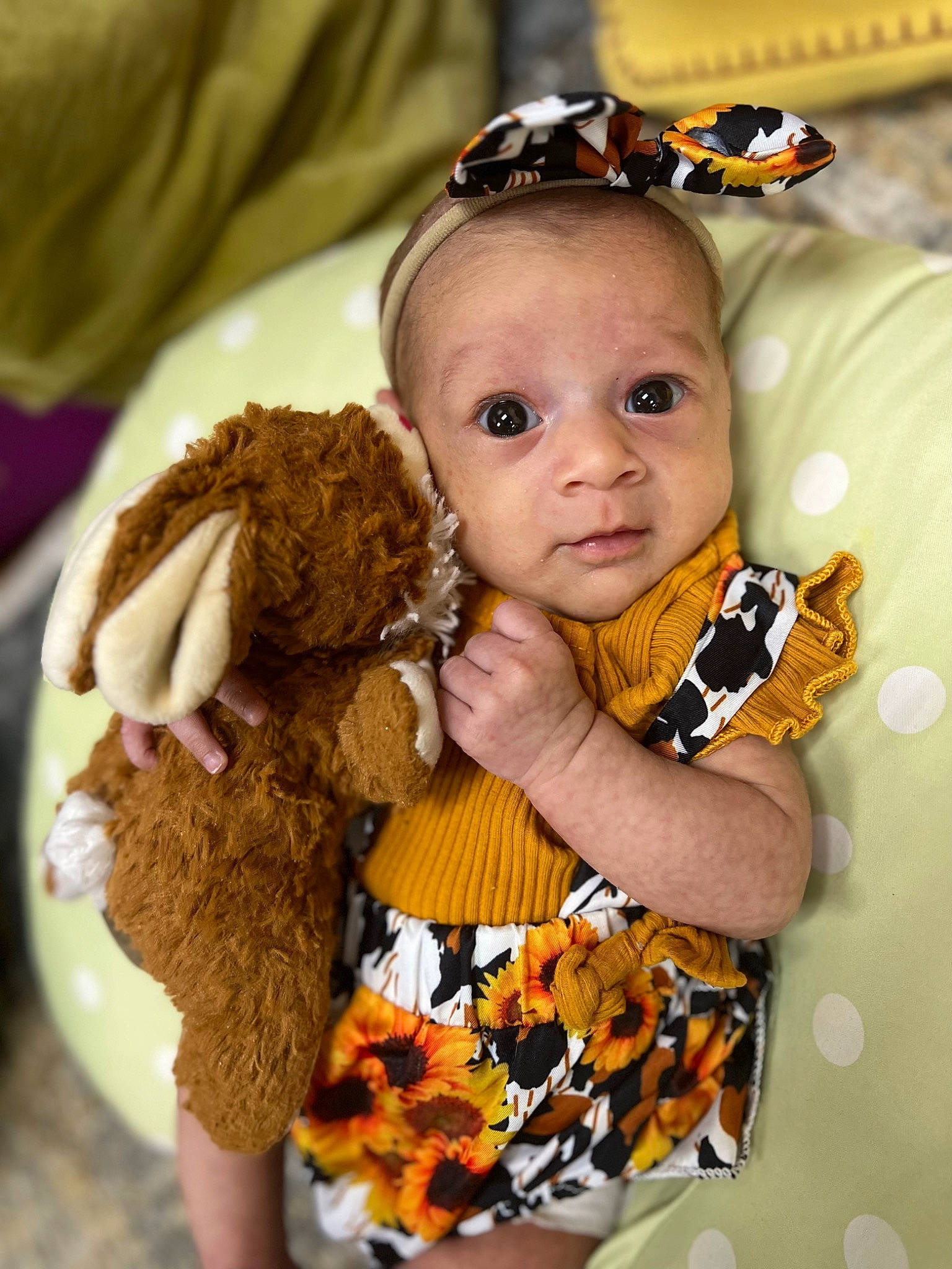 Everleigh is registered to the contest to win money with this photo: baby, baby_products, baby_toddler_clothing, child, eyelash, fashion_accessory, fawn, fun, hair_accessory, happy, headband, headpiece, iris, jewellery, pattern, person, sitting, skin, toddler, toy