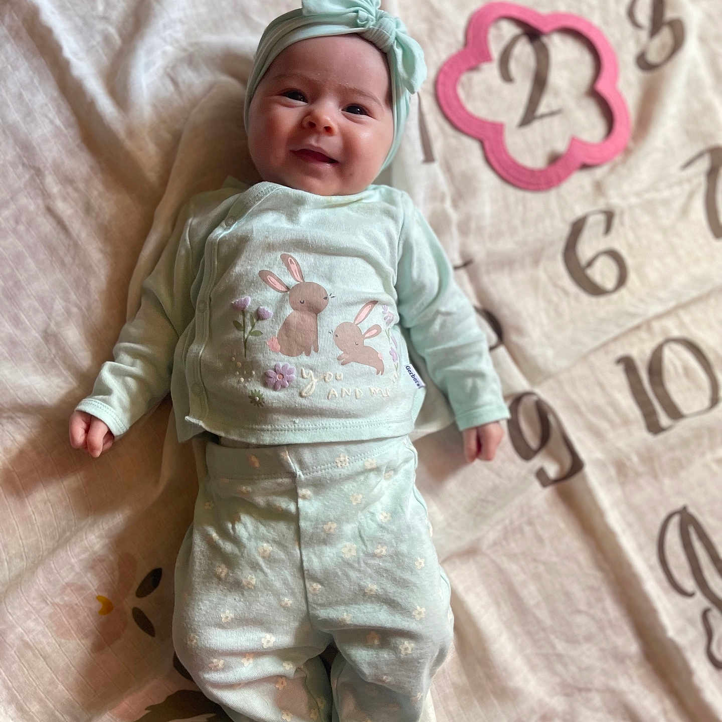 Rosaiya is registered to the contest to win money with this photo: baby, babylaughing, bed, blanket, clothing, face, furniture, glove, happy, hat, head, homedecor, newborn, pajamas, pants, person, photography, portrait, quilt, yawning