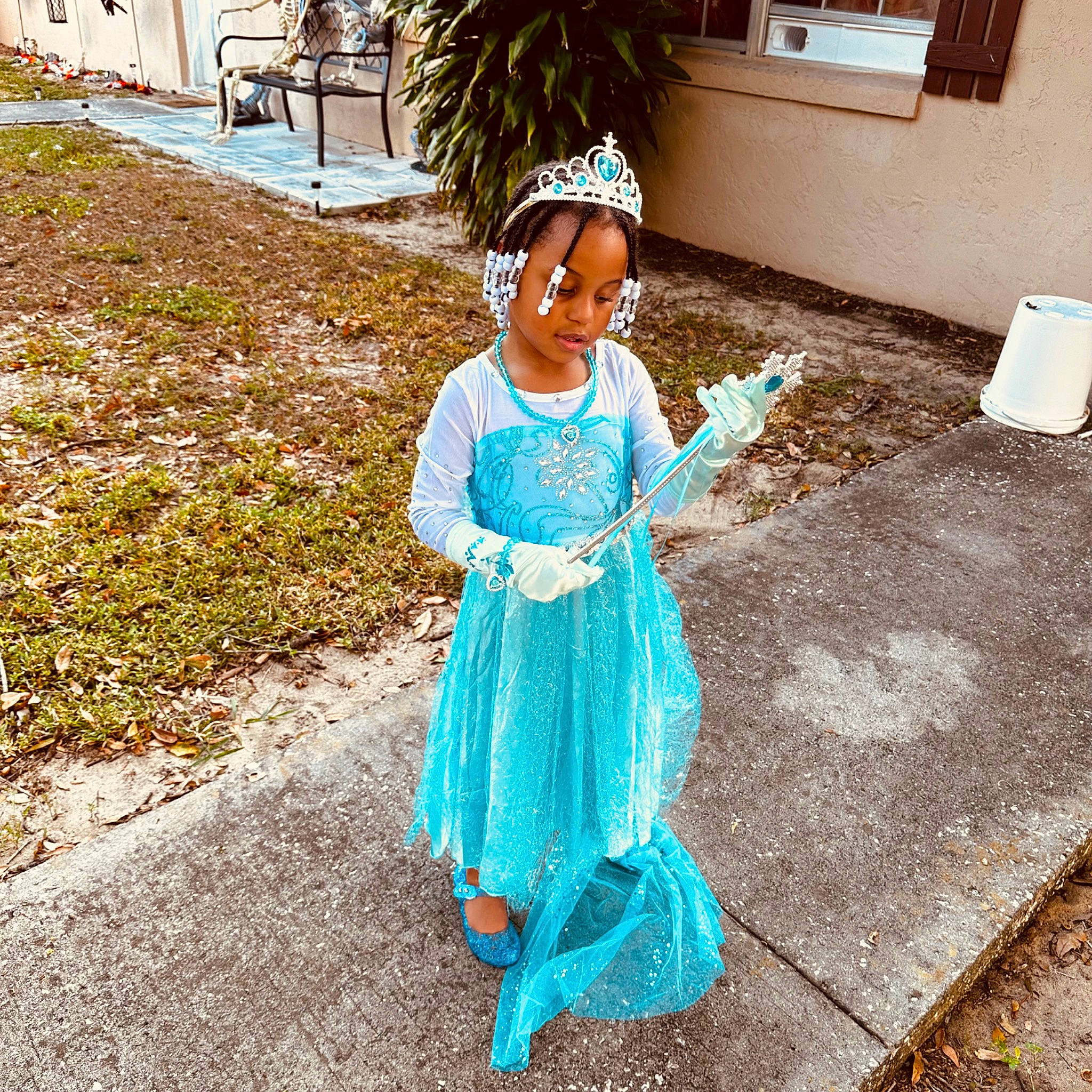 Anastasia is registered to the contest to win money with this photo: asphalt, blue, child, dress, electric_blue, event, fashion_accessory, fun, grass, green, happy, hat, leisure, paper_towel, people_in_nature, person, plant, road, smile, toddler