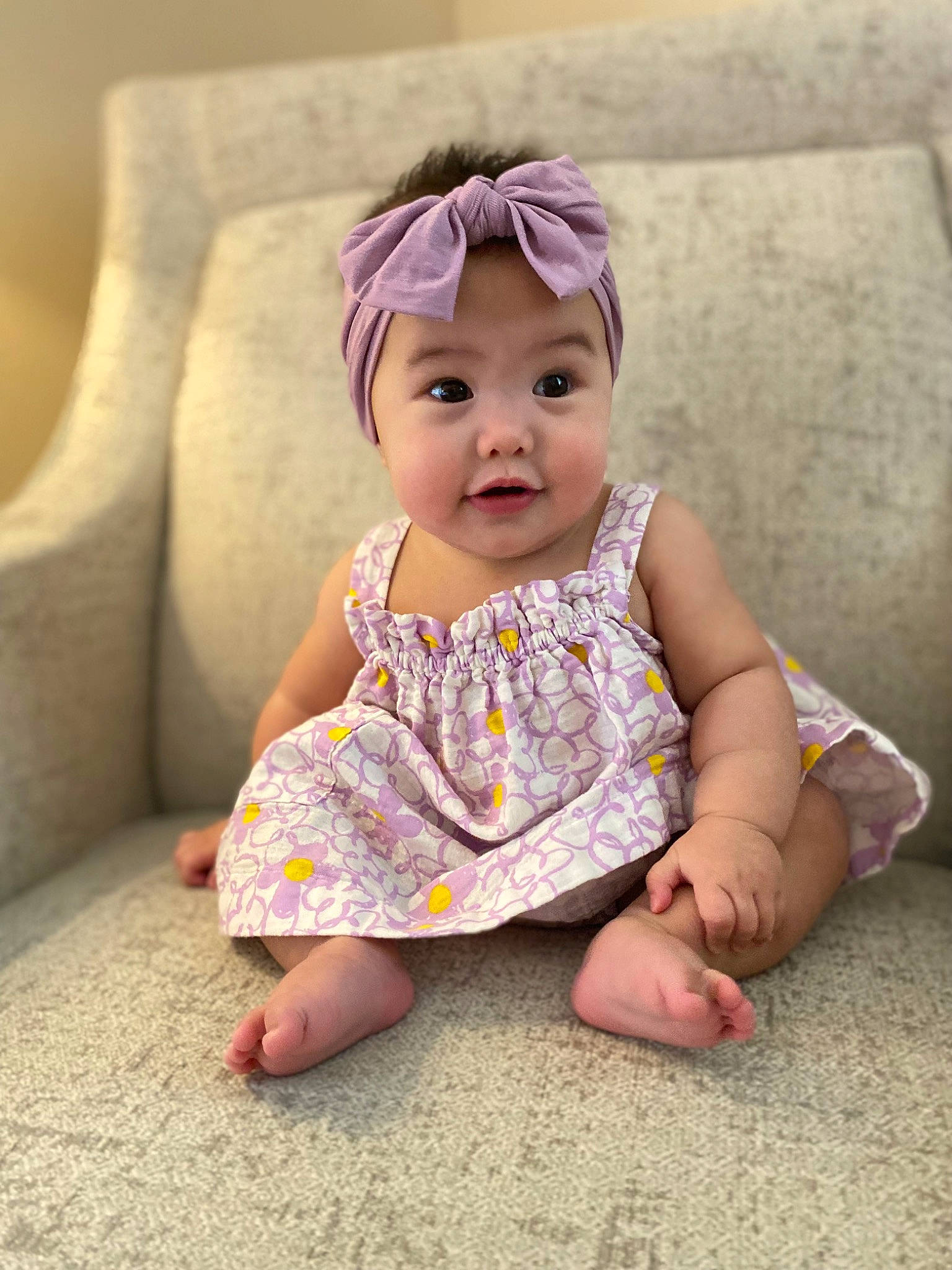 Kora joined the competition — help win amazing prizes! baby, baby_toddler_clothing, cheek, child, dress, eye, fashion_accessory, foot, grass, happy, headband, headpiece, headwear, iris, pattern, person, pink, sitting, skin, sleeve