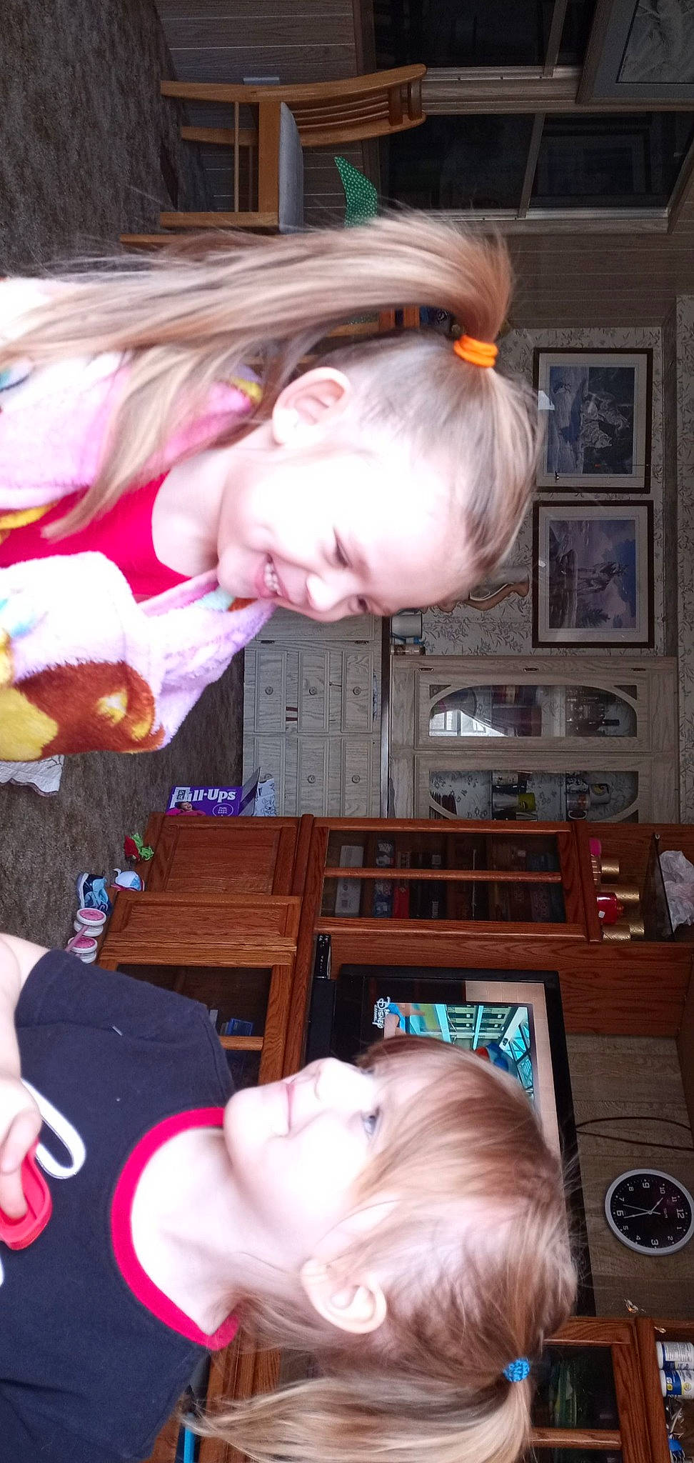 Luna is registered to the contest to win money with this photo: audio_equipment, child, ear, event, eyewear, fun, gadget, hair, happy, human_leg, joy, long_hair, mouth, muscle, office_equipment, organ, person, picture_frame, room, snapshot