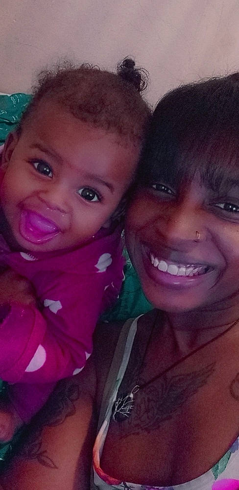 Siena is registered to the contest to win money with this photo: cheek, chin, ear, eye, eyebrow, eyelash, face, forehead, hair, head, human_body, jaw, joy, lip, mouth, muscle, nose, organ, person, purple