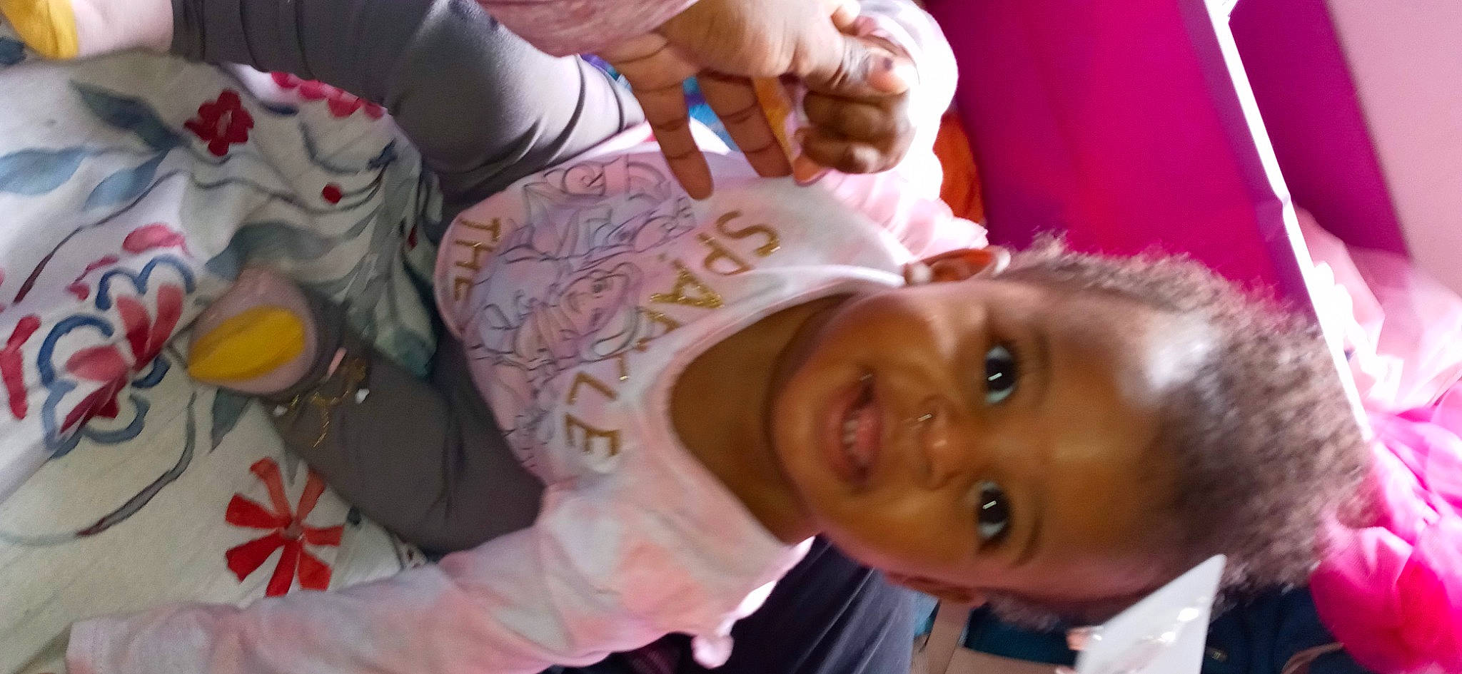 Siena is registered to the contest to win money with this photo: baby, cheek, child, ear, event, eyelash, fun, gesture, happy, hat, joy, mouth, nail, nose, person, selfie, skin, smile, thumb, toddler