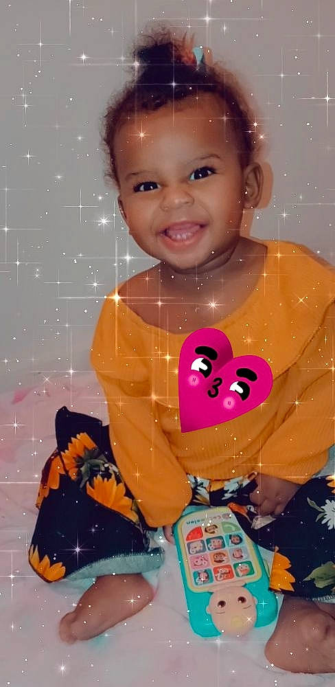 Siena is registered to the contest to win money with this photo: arm, baby, baby_toddler_clothing, bathing, cheek, child, circle, fun, happy, head, joy, party_supply, person, pink, play, sleeve, smile, sweetness, t_shirt, toddler