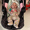 Annaaleyah joined the competition — help win amazing prizes! baby, infant, car_seat, onesie, headband, pacifier, toy, black, pink, floral_pattern, blanket, indoor, child, cute, sleepwear, infant_clothing, playful, resting, soft_lighting, portrait