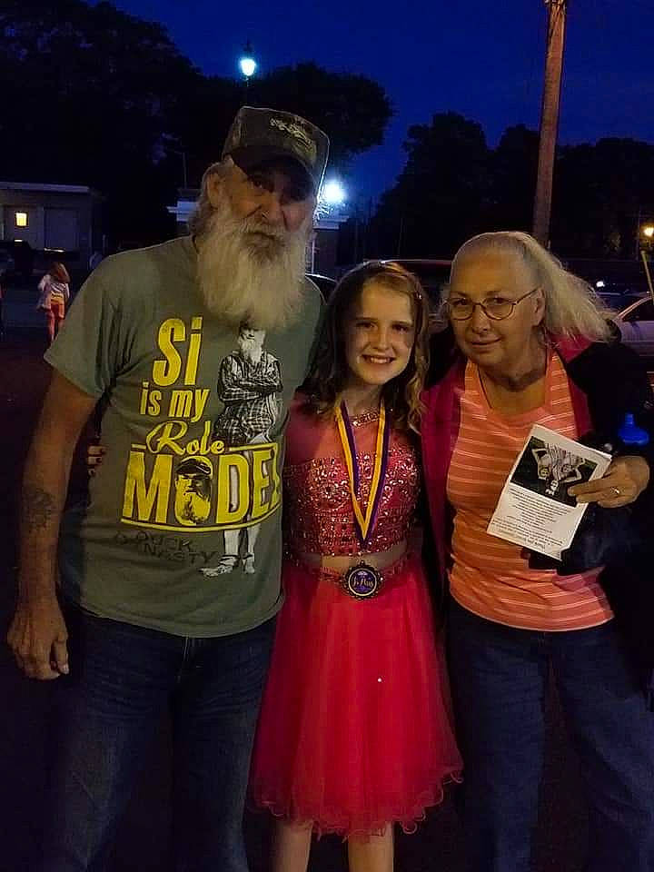 Emma is registered to the contest to win money with this photo: event, fun, joy, person, photography, t_shirt, world