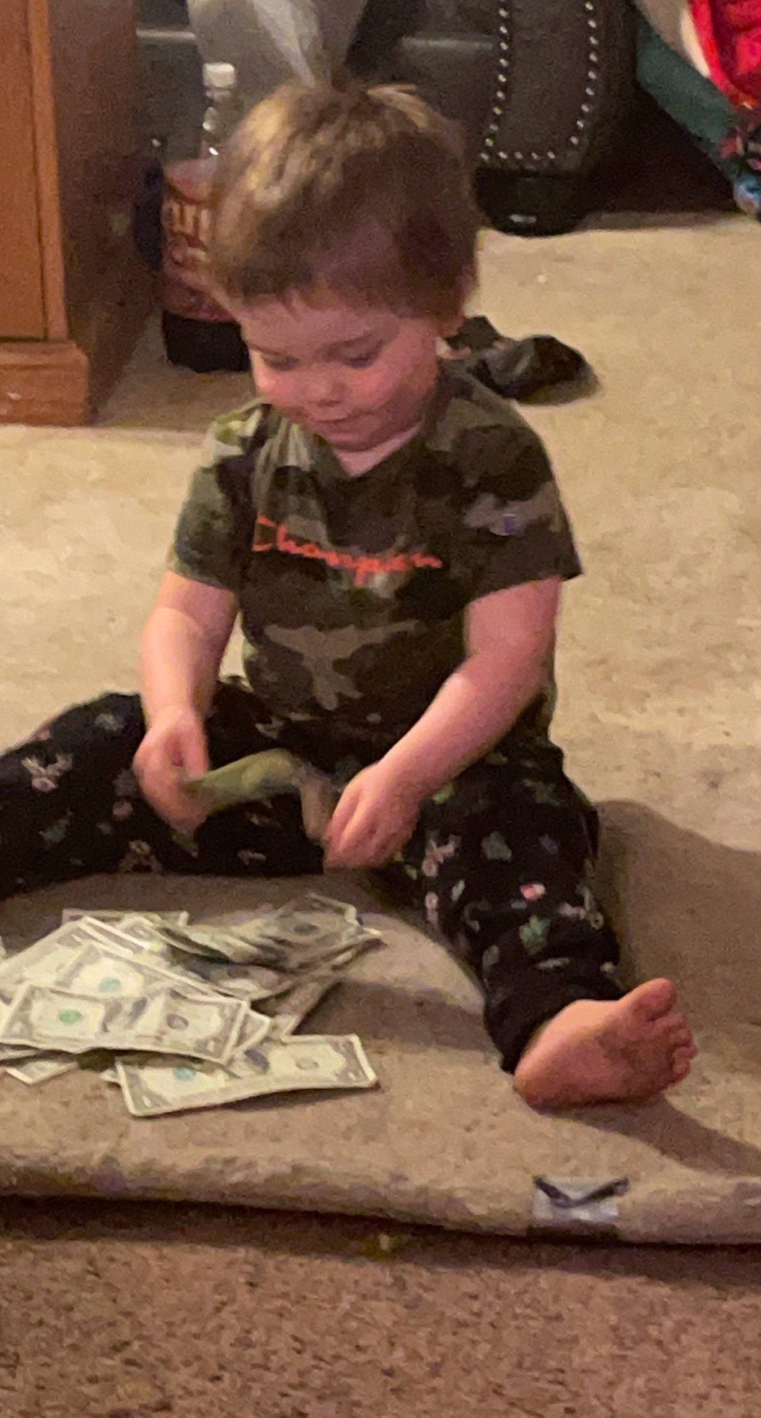 Zaydrik joined the competition — help win amazing prizes! army, camouflage, child, flooring, fun, military, military_camouflage, military_uniform, pattern, person, play, sitting, sleeve, soil, soldier, tire, toddler, wheel, wood