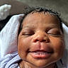 baby, newborn, smiling, face, closeup, infant, sleeping, child, cute, skin, blanket, portrait, peaceful, soft, indoors, head, expression, human, young, toddler