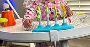 Areonna is registered to the contest to win money with this photo: baby, child, toddler, smiling, indoors, activity_walker, toy, pink_pajamas, hello_kitty, infant, standing, playtime, nursery, window, blinds, household, furniture, colorful, portrait, happy