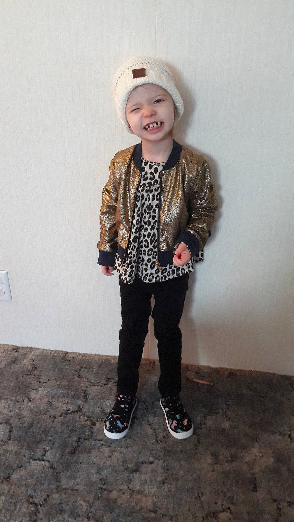 Crimson is registered to the contest to win money with this photo: cap, child, child_model, clothing, fashion_accessory, footwear, fun, hat, headgear, headwear, jacket, jeans, outerwear, person, shoe, sleeve, smile, standing, style, t_shirt