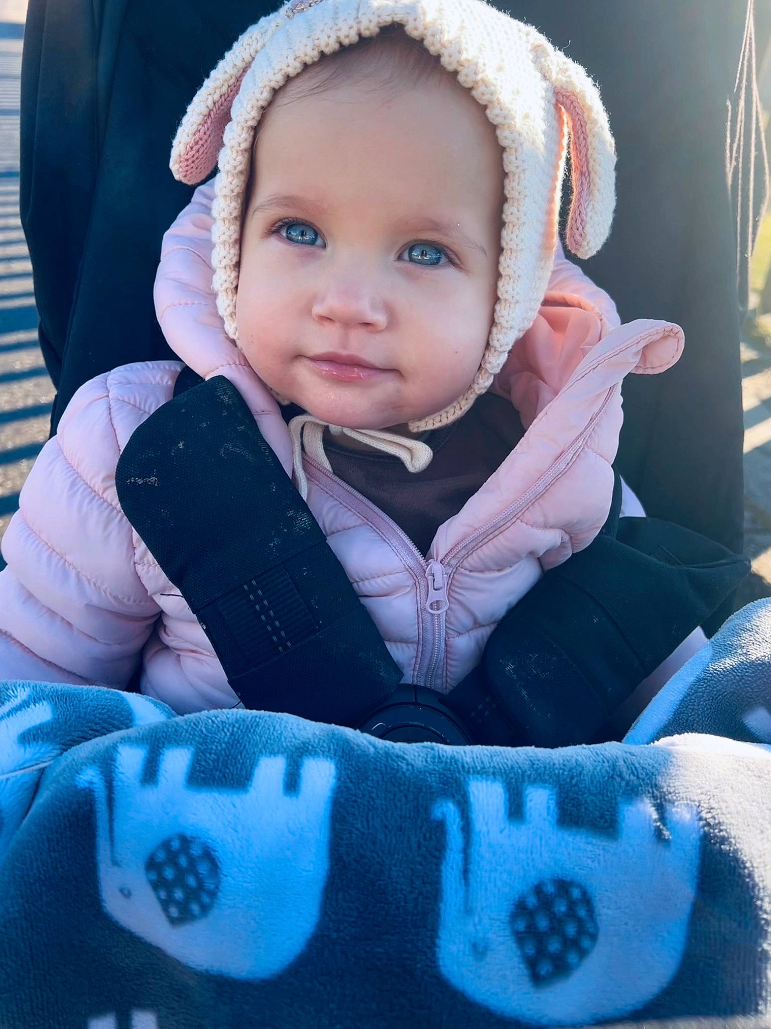 Sophie joined the competition — help win amazing prizes! azure, baby, baby_carriage, baby_products, baby_toddler_clothing, blue, cap, cheek, child, comfort, electric_blue, eye, flash_photography, happy, headwear, iris, person, photograph, sitting, sleeve