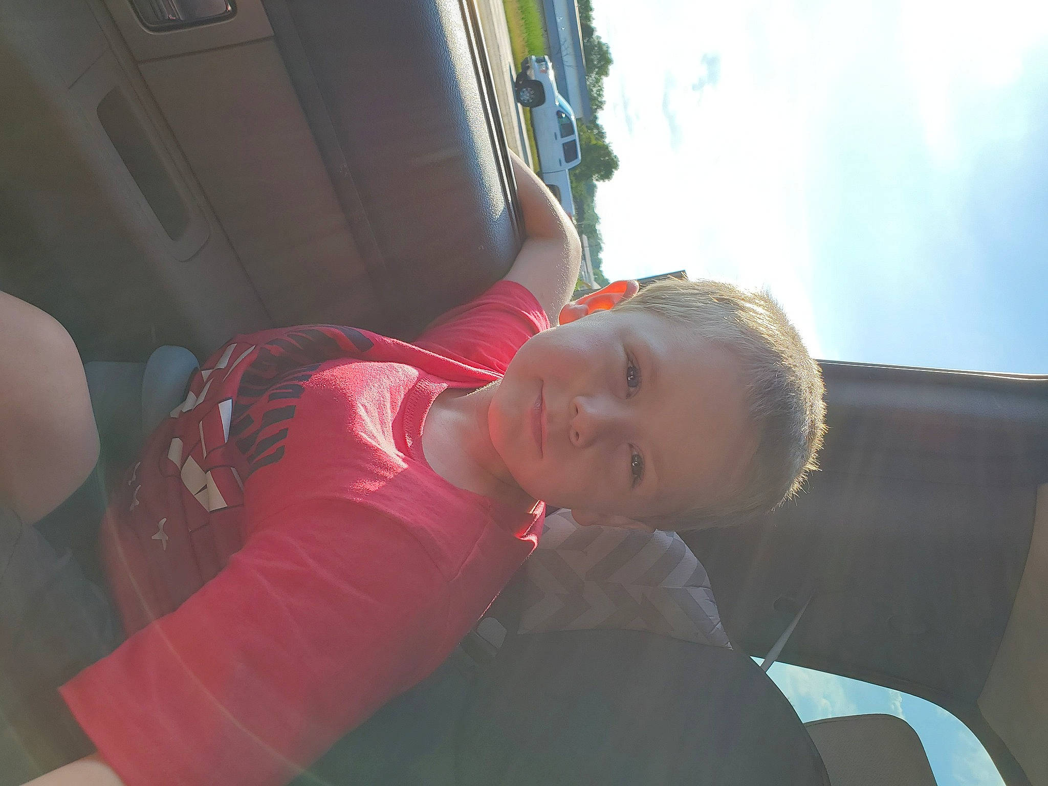 Jeffrey is registered to the contest to win money with this photo: child, ear, fun, mouth, nap, neck, person, skin, sunlight, toddler, vacation