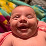 Aleeah Mcclung is registered to the contest to win money with this photo: baby, babylaughing, bodypart, face, furniture, happy, head, laughing, mouth, newborn, person, photography, portrait, quilt, selfie, smile, teeth, towel