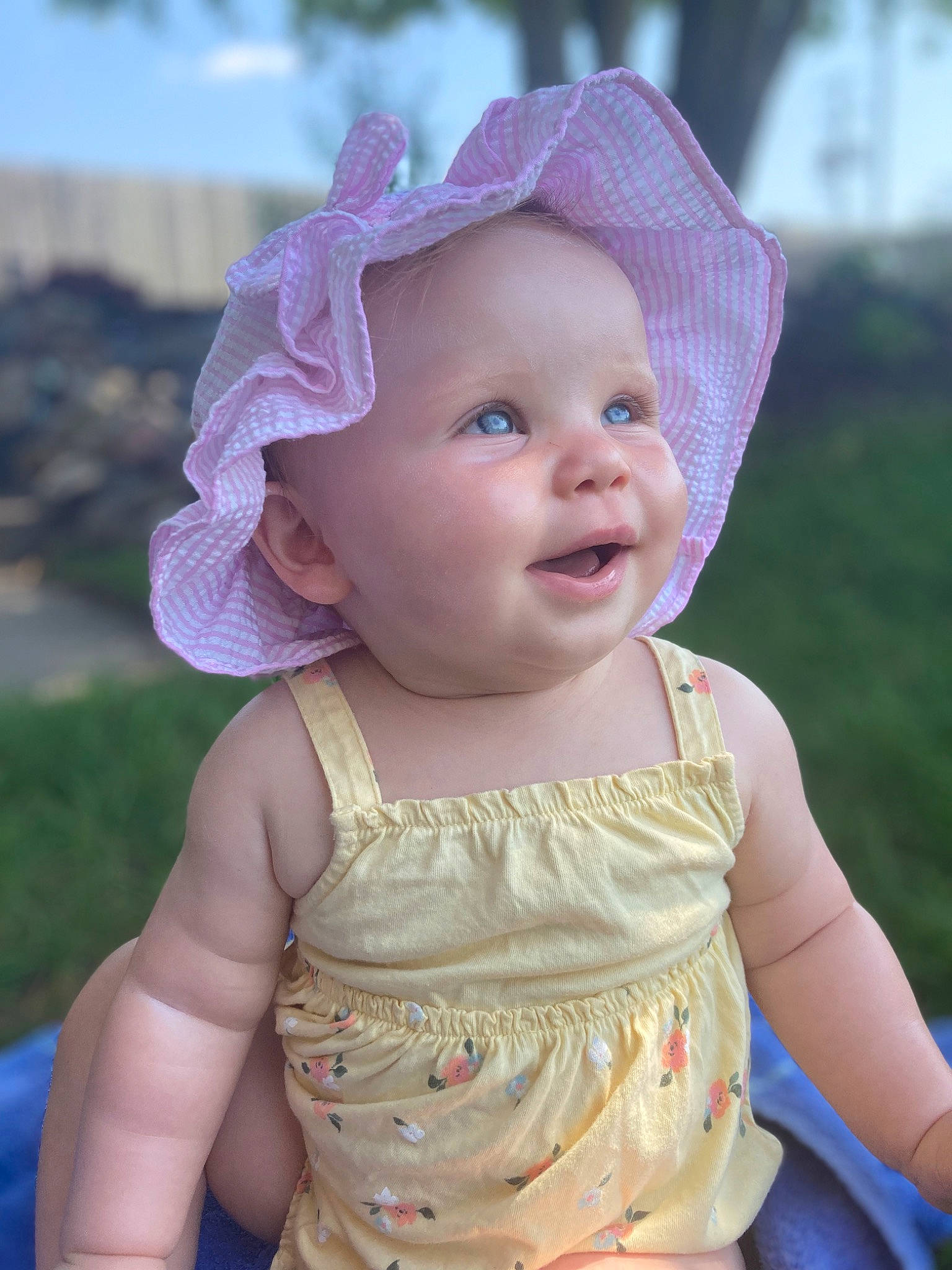 Cambree joined the competition — help win amazing prizes! baby, baby_toddler_clothing, cap, cheek, child, dress, embellishment, grass, happy, hat, iris, lip, pattern, person, pink, skin, sleeve, smile, sun_hat, toddler