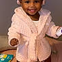Malaun joined the competition — help win amazing prizes! baby, child, smiling, robe, bonnet, bed, blanket, wipes, person, indoor, happy, cute, infant, soft, pink, clothing, foot, face, standing, holding