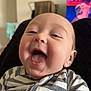baby, smiling, laughing, striped_clothing, infant, face, happy, person, indoors, closeup, cute, young_child, head, skin, mouth_open, teeth, eyes, comfort, home, television