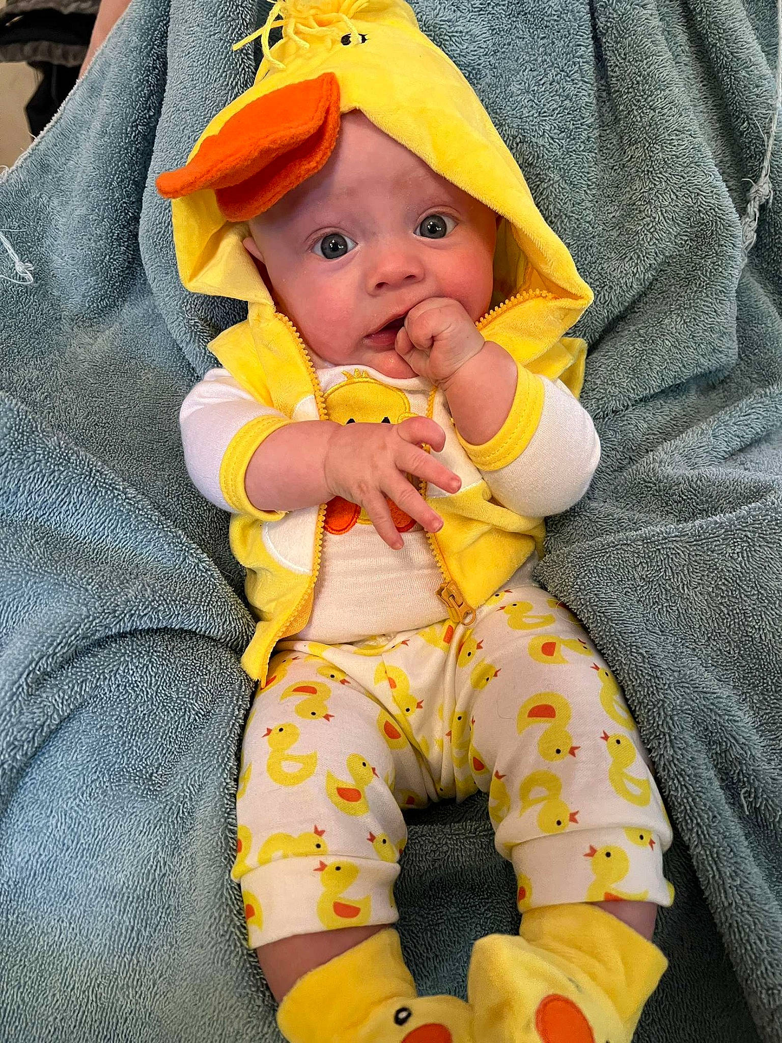 Chloe is registered to the contest to win money with this photo: baby, baby_products, baby_toddler_clothing, baseball_cap, cap, child, comfort, eye, fashion_accessory, fun, hat, headwear, lap, linens, nail, outerwear, pattern, person, sitting, sleeve