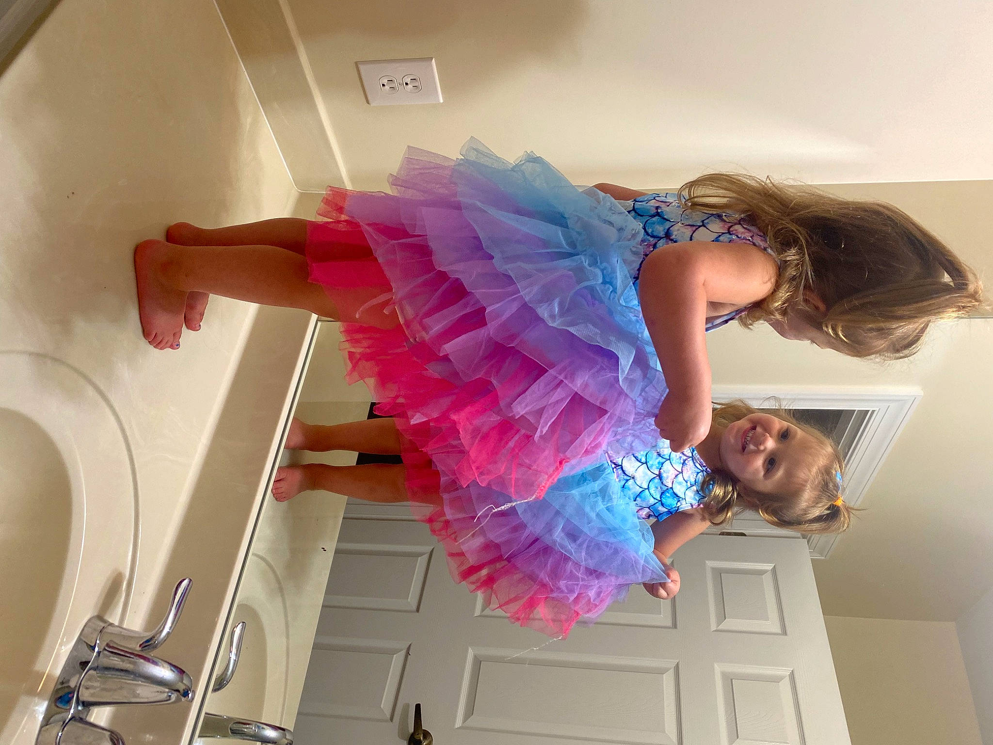 Isabella is registered to the contest to win money with this photo: baby_toddler_clothing, beauty, ceiling, child, comfort, costume, fashion_design, flooring, fun, happy, human_leg, joy, magenta, person, pink, purple, room, sleeve, t_shirt, thigh