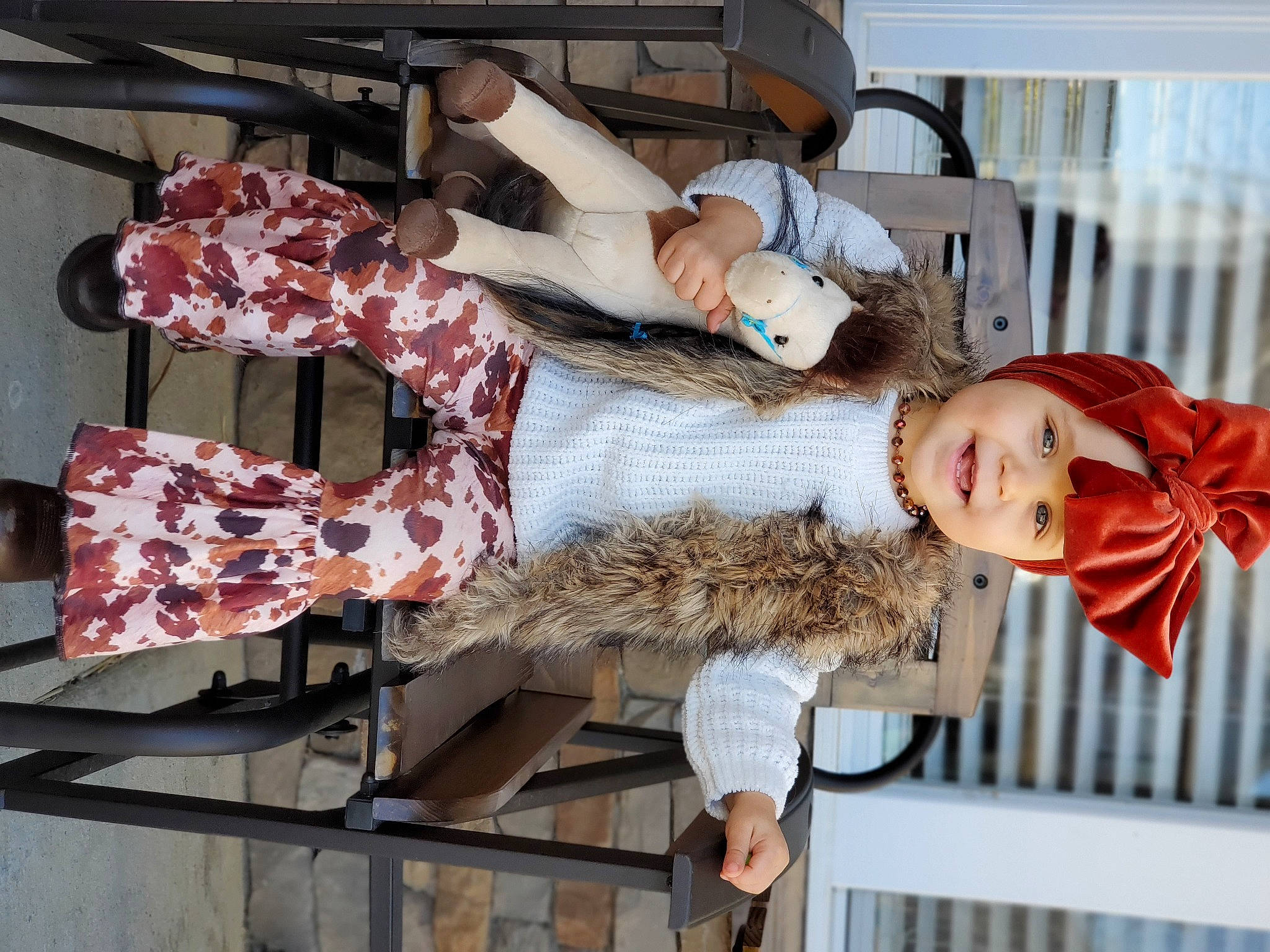 Meadow is registered to the contest to win money with this photo: costume, fashion_design, fence, flesh, fun, fur, headwear, joy, pattern, person, room, street_fashion, textile, wood