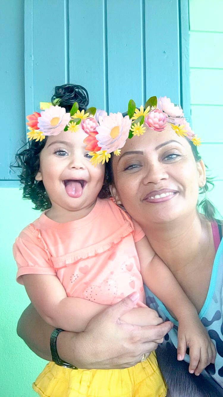 Ketlyne participe au concours pour gagner de l'argent avec cette photo : cheek, child, crown, fashion_accessory, flower, fun, hair_accessory, happy, headband, headgear, headpiece, headwear, joy, lei, person, photography, smile, toddler, yellow