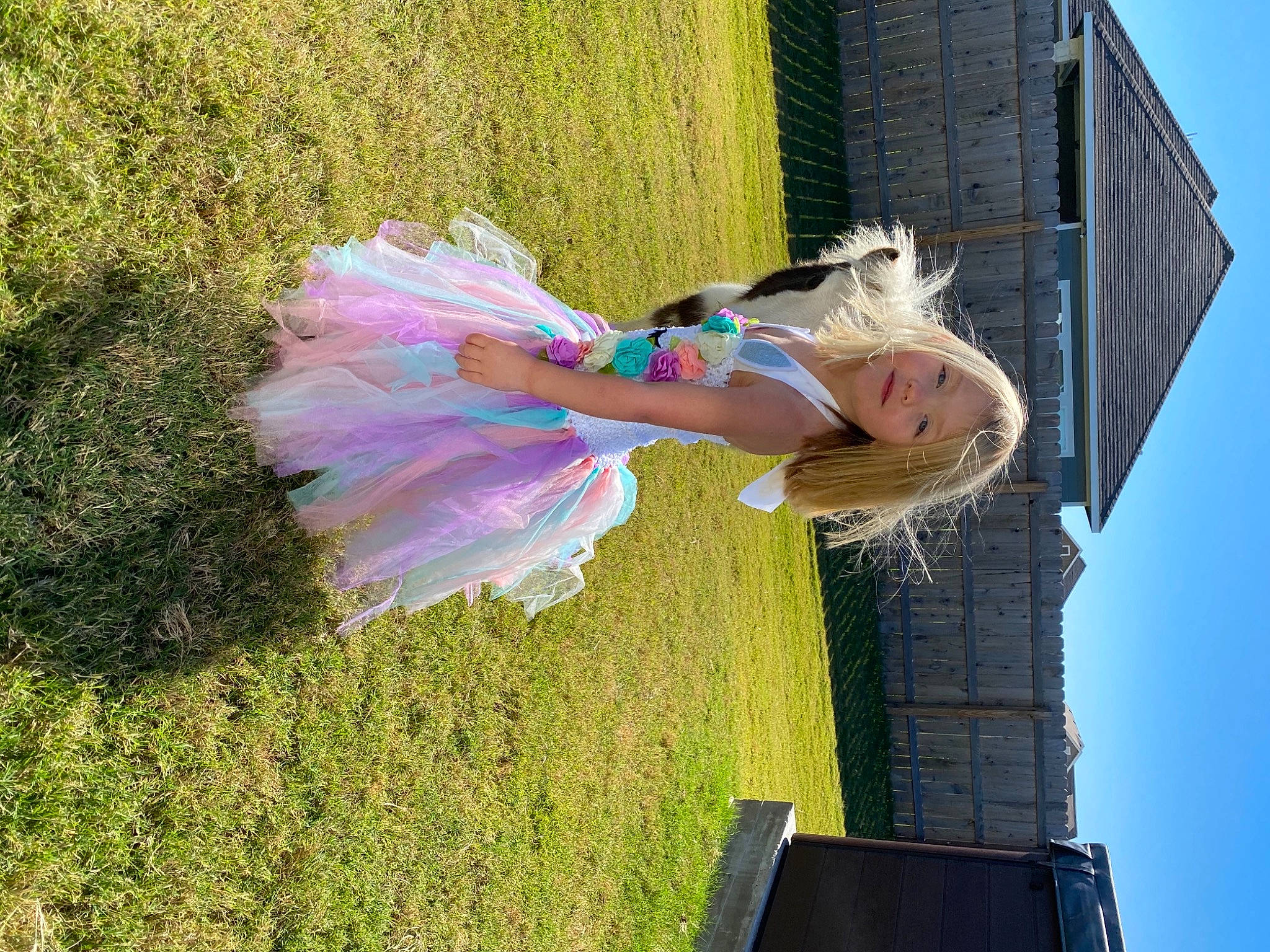 Kensington is registered to the contest to win money with this photo: blue, electric_blue, fashion_accessory, feather, fun, grass, happy, leisure, magenta, people_in_nature, person, pink, plant, purple, shadow, sky, smile, toddler